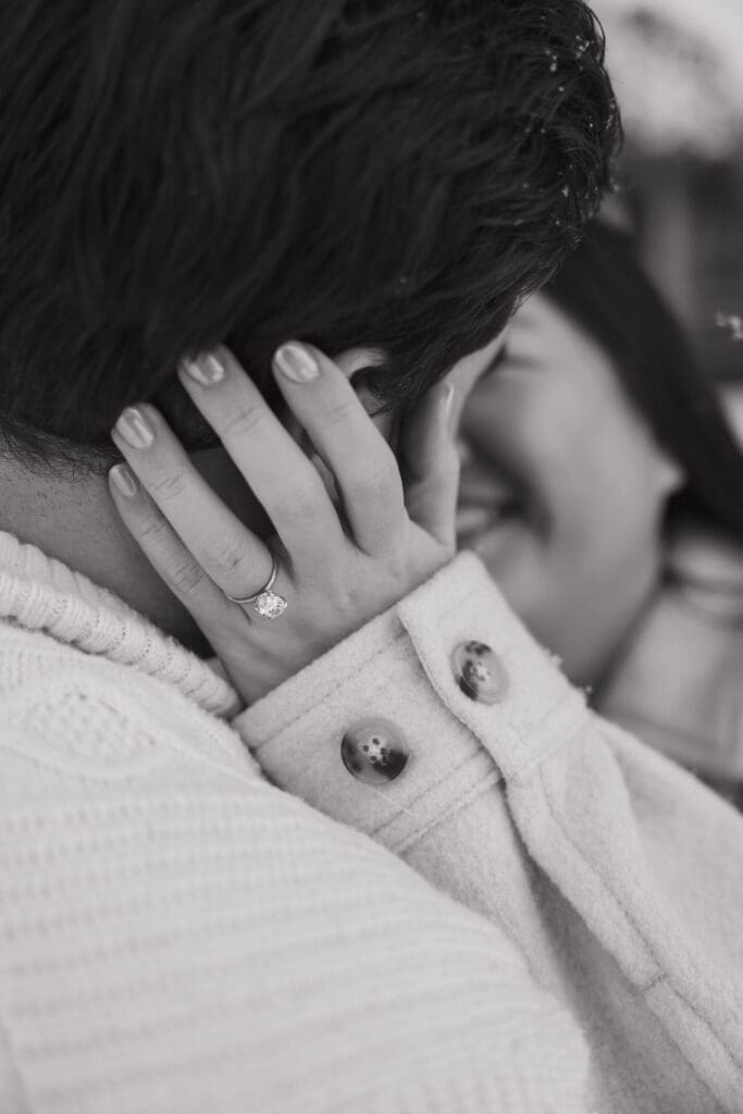 Close-up of engagement ring during snowy Mount Hood engagement photos in Oregon