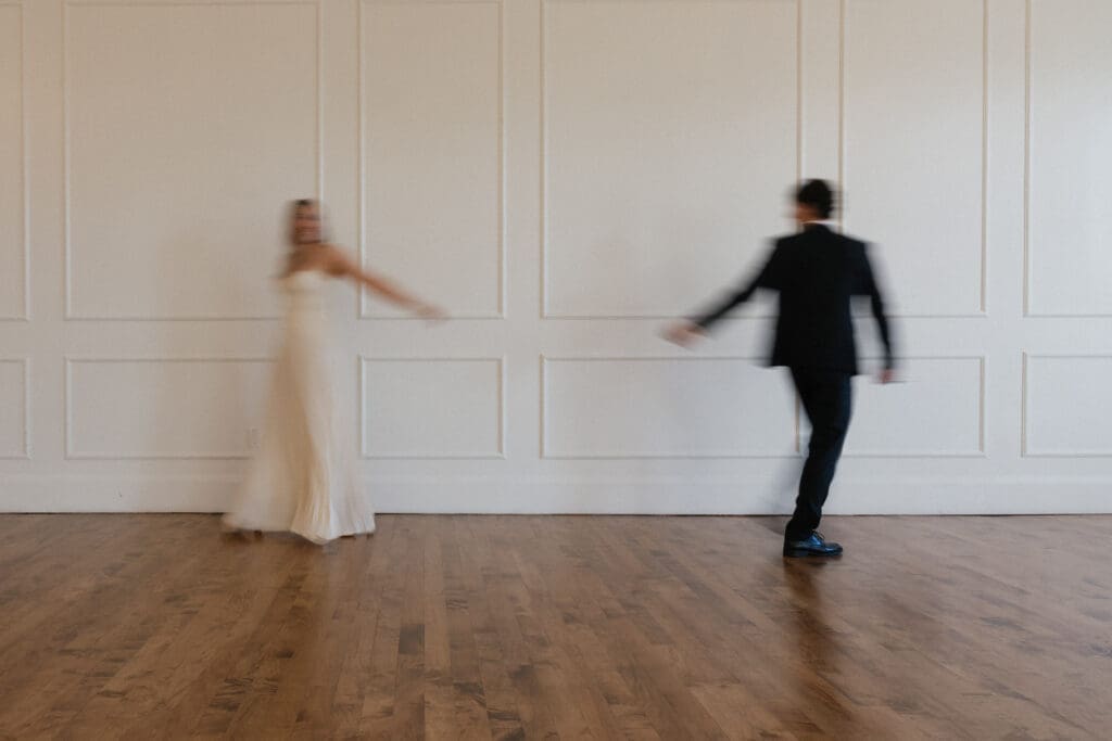 Motion blur engagement portrait of couple dancing at The Arc Light in Oregon City, Oregon
