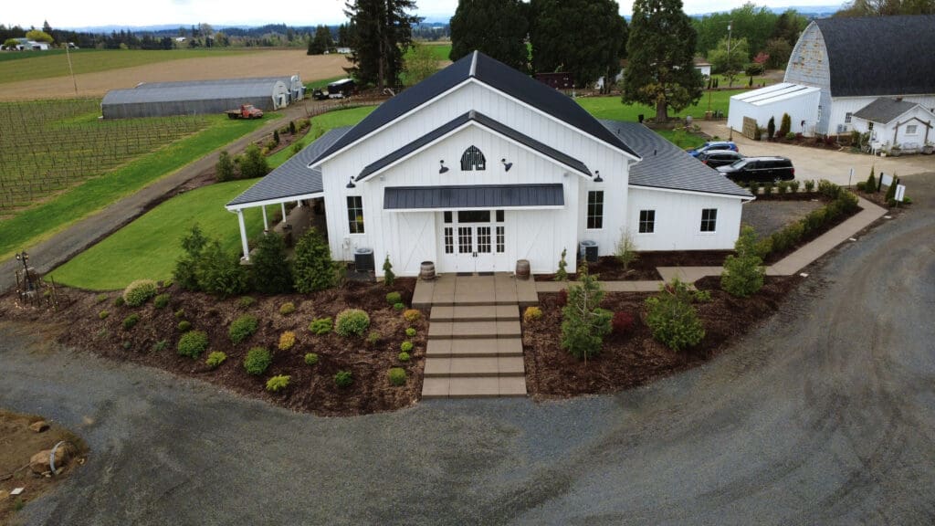 Aerial view of The Farm on Golden Hill wedding venue in Silverton Oregon surrounded by vineyards and open countryside