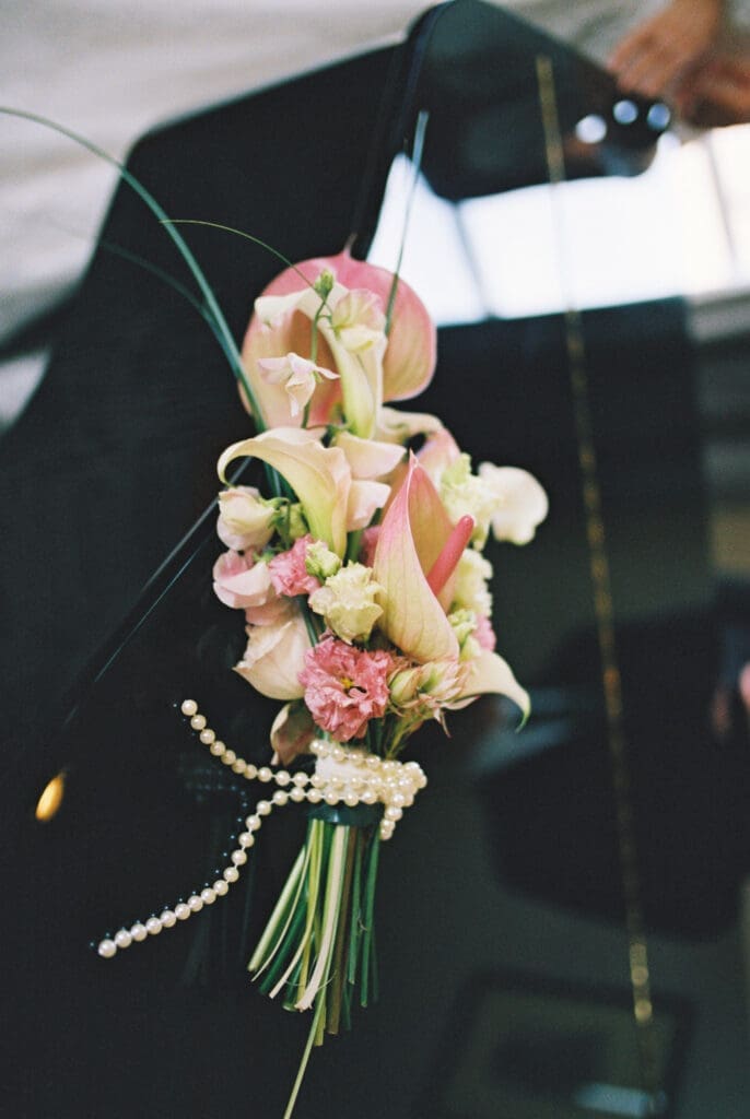 Pastel wedding bouquet with calla lilies and pearls photographed on film at Black Walnut Inn & Vineyard in Dundee, Oregon.