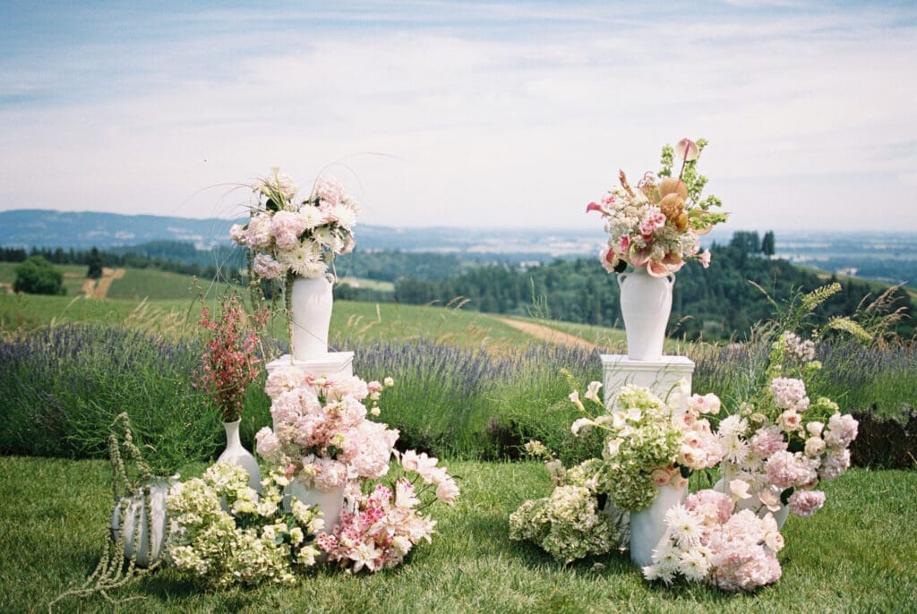 Film photograph of floral ceremony arrangements overlooking the vineyards at Black Walnut Inn in Dundee, Oregon.
